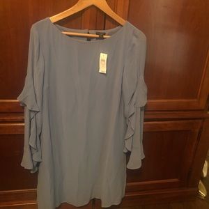 Beautiful  raffles sleeves dress with the tag